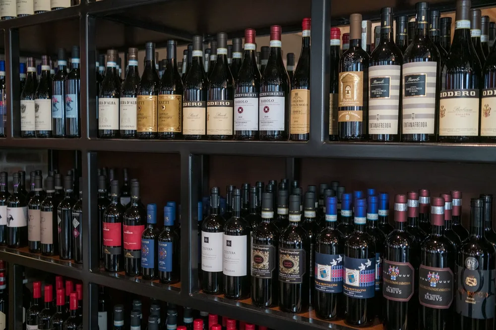 Shelves of Italian wine at Maribella, Barolo and Chianti Classico among them